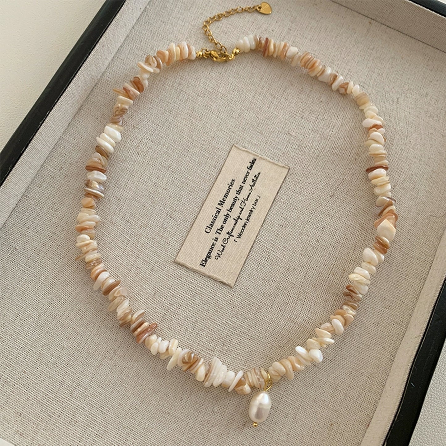 Irregularly Shaped Seashell and Crushed Stone Pearl Necklace
