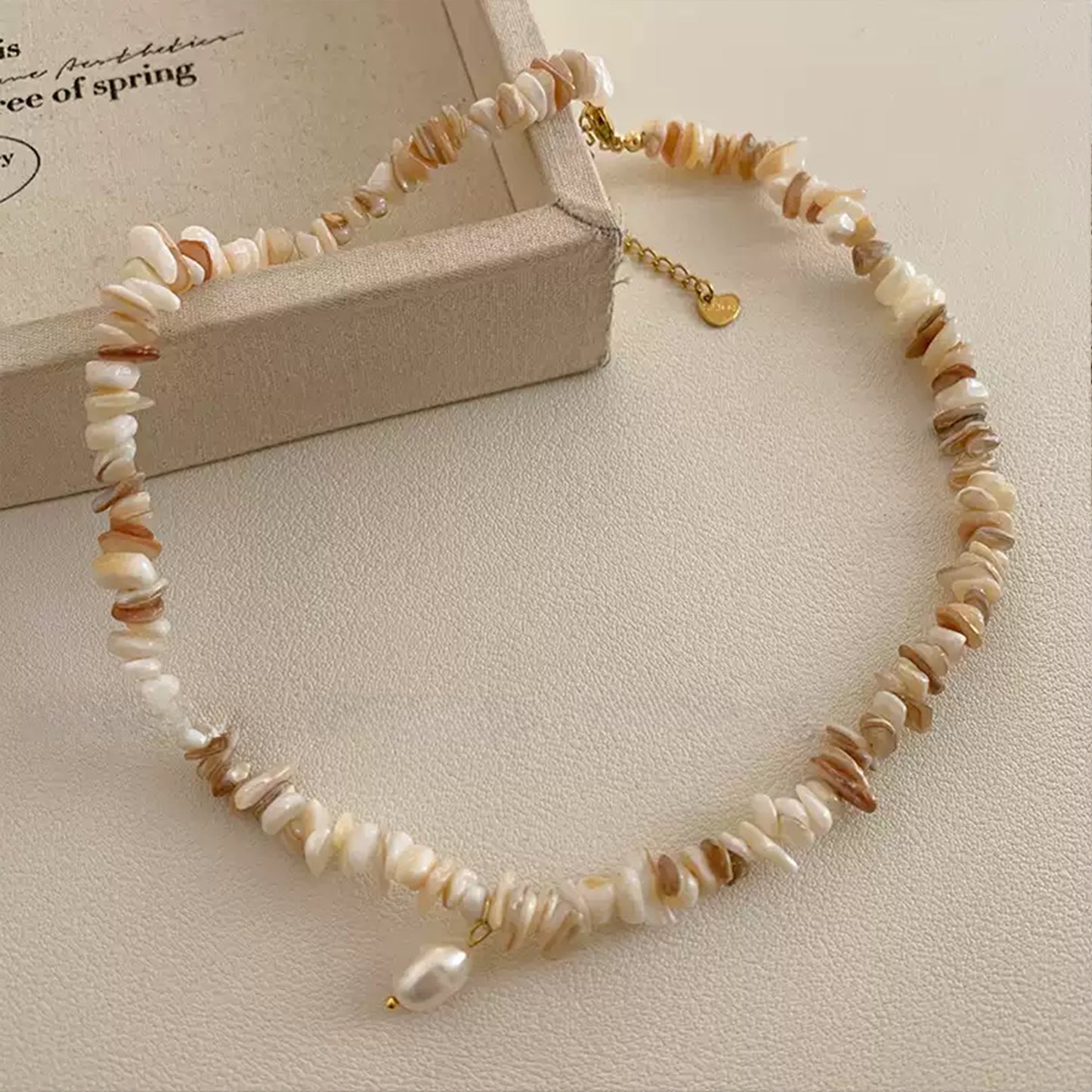 Irregularly Shaped Seashell and Crushed Stone Pearl Necklace